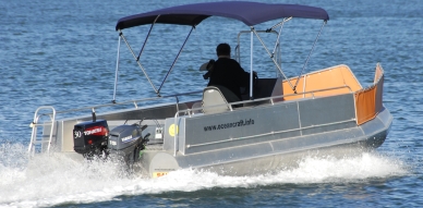The 6000 Extreme Fisher is a centre console rig with a bimini for weather protection.